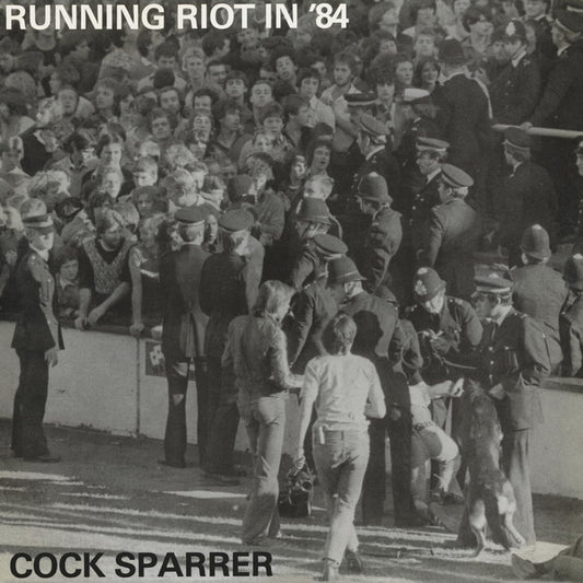 Cock Sparrer LP - Running Riot In ‘84 (Black Ice/White Splatter Vinyl) | Buy Now For 34.99