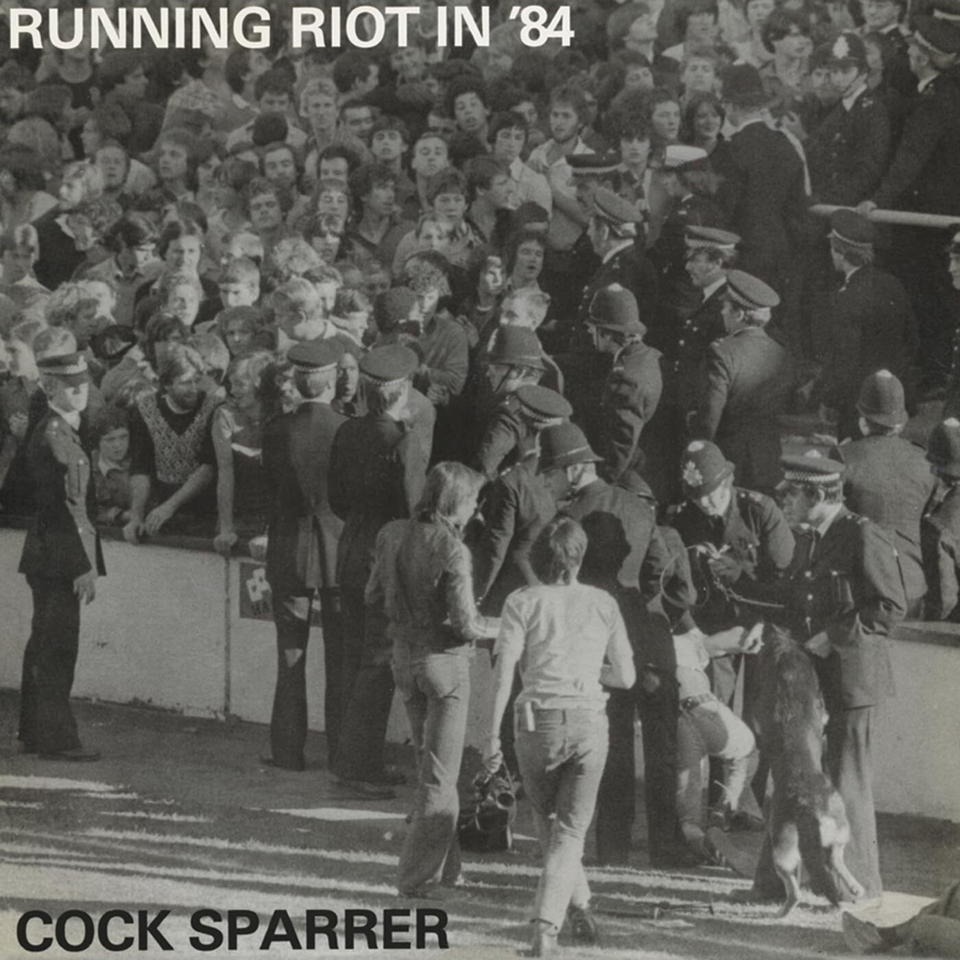 Cock Sparrer LP - Running Riot In ‘84 (Black Ice/White Splatter Vinyl) | Buy Now For 34.99